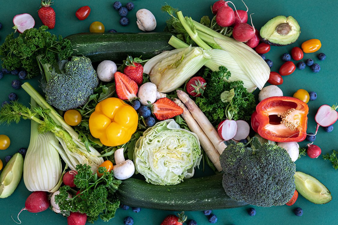 Close-up, bright fresh vegetables, fruits and berries.